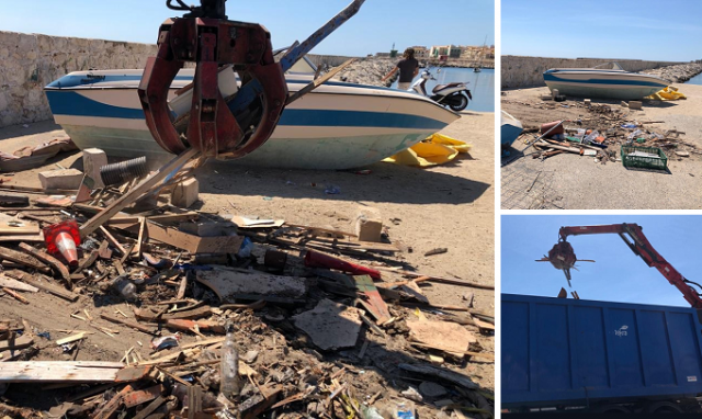 Siracusa, spiaggetta dello Sbarcadero: uomini e mezzi al lavoro per liberare l'arenile da resti di imbarcazioni abbandonate
